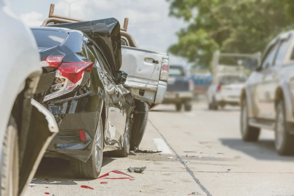 Damaged cars after a road collision, representing car accident and road traffic accident compensation claims.