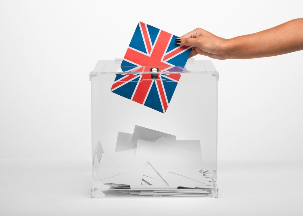 UK flag entering ballot box – vote for me.
